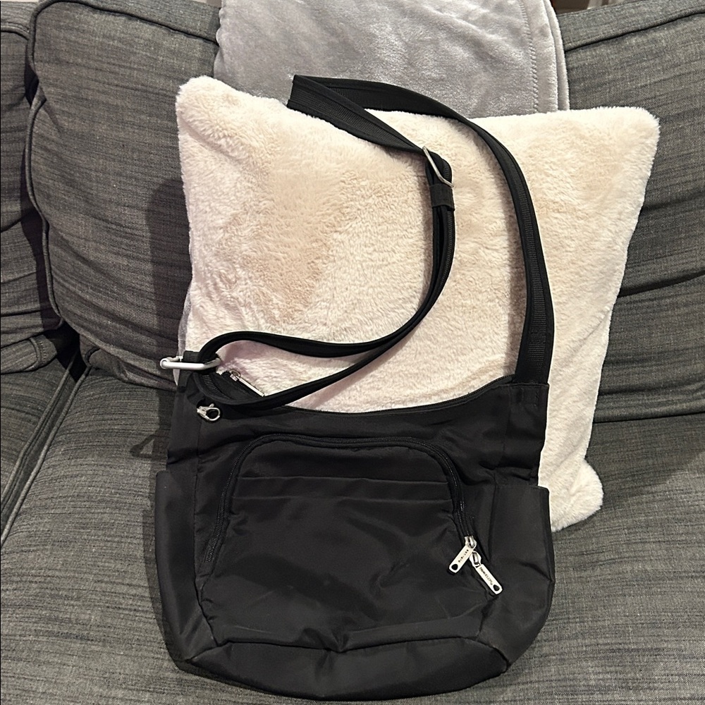 The Classic Travelon 5 Point Anti-Theft/Anti-Slash Bucket Bag. 14"W x 11"H x 4"D